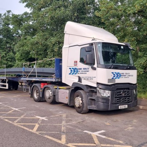 photo of a truck with an extended flatbed owned by Richard Tovey Transport Limited